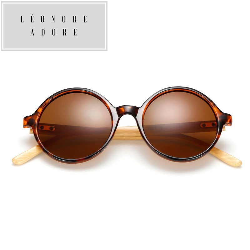 Occhiali da sole rotondi in bambù. L'eleganza è nella consapevolezza della materia.