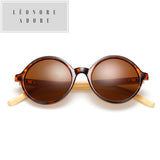 Occhiali da sole rotondi in bambù. L'eleganza è nella consapevolezza della materia.