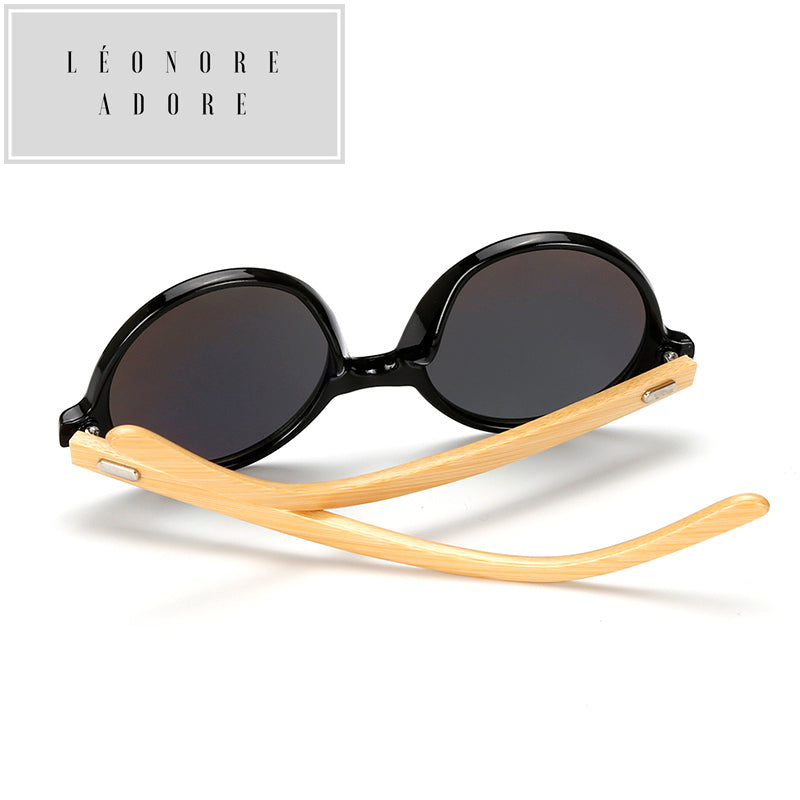 Occhiali da sole rotondi in bambù. L'eleganza è nella consapevolezza della materia.