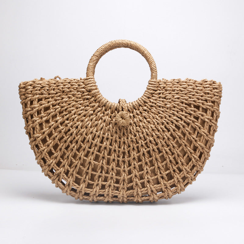 Sac de plage en paille, style rondement rétro. Avec une poche intérieure pour votre téléphone.