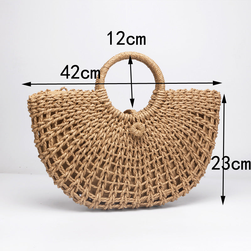 Sac de plage en paille, style rondement rétro. Avec une poche intérieure pour votre téléphone.