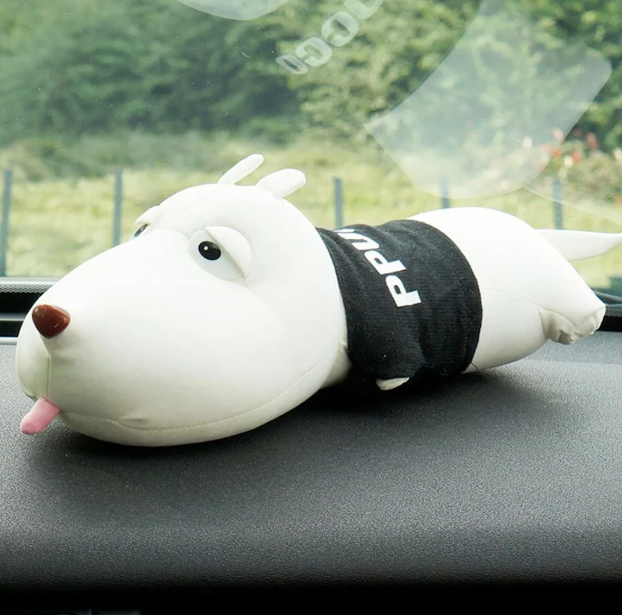 A puppy all flattened to cool the air in the car with bamboo activated charcoal!